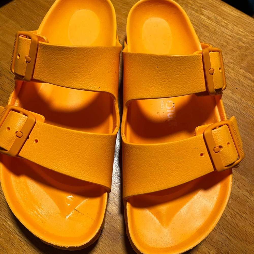 Ladies Birkenstocks sandals plastic, orange size 7